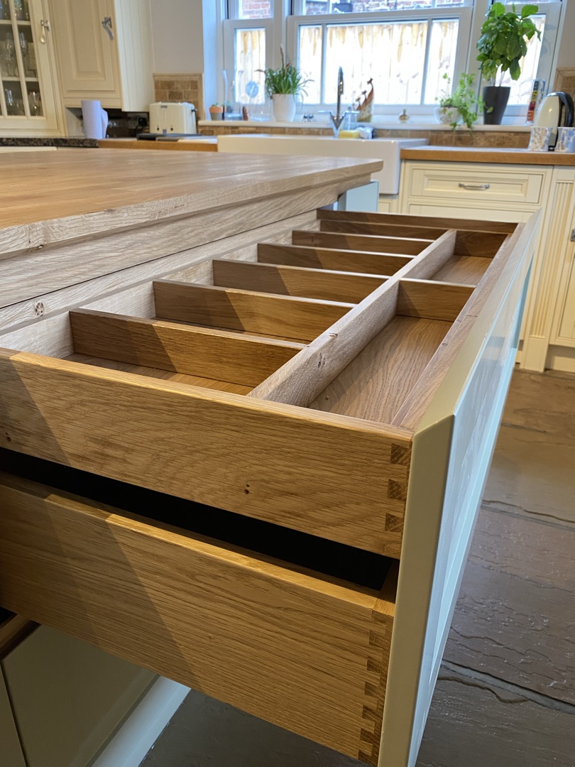Dovetail joinery in solid oak drawer — traditional craftsmanship by Grays Bespoke Interiors