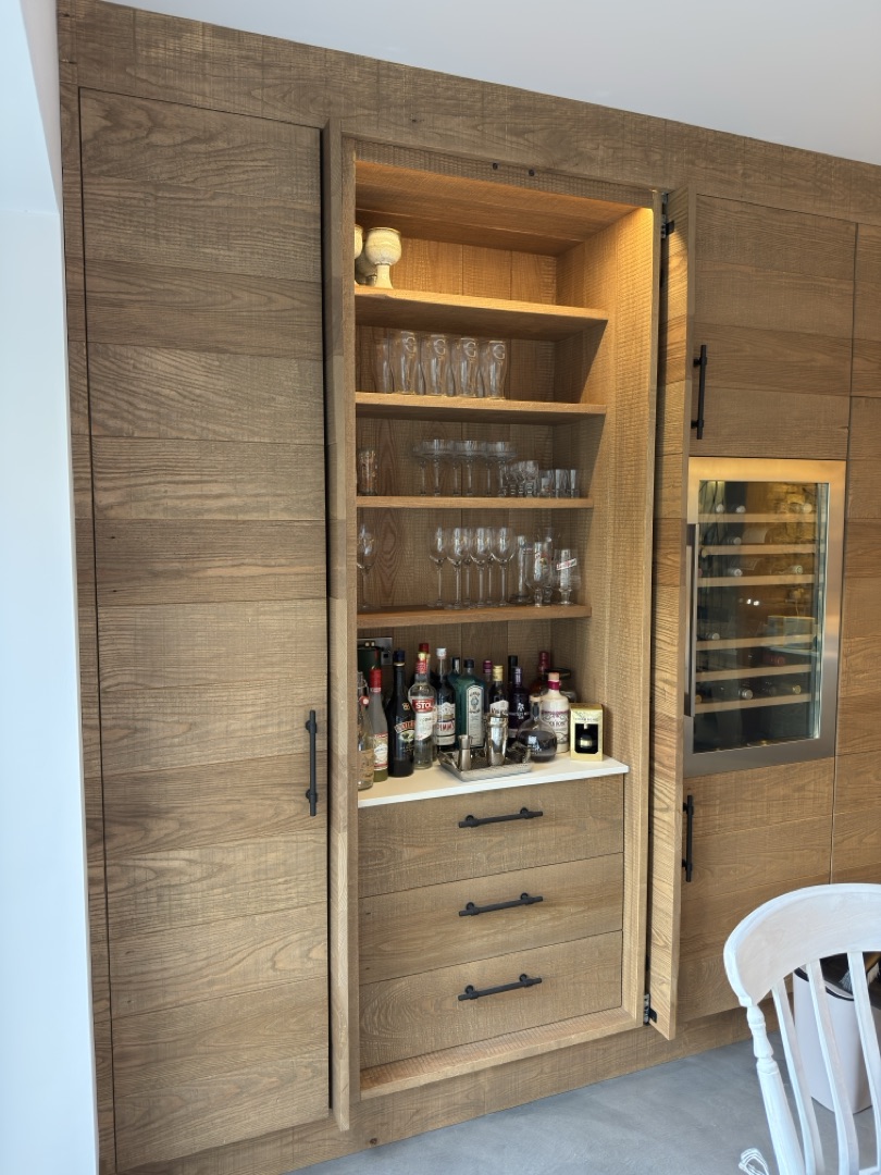 Watermill Lodge — drinks cabinet lit interior detail