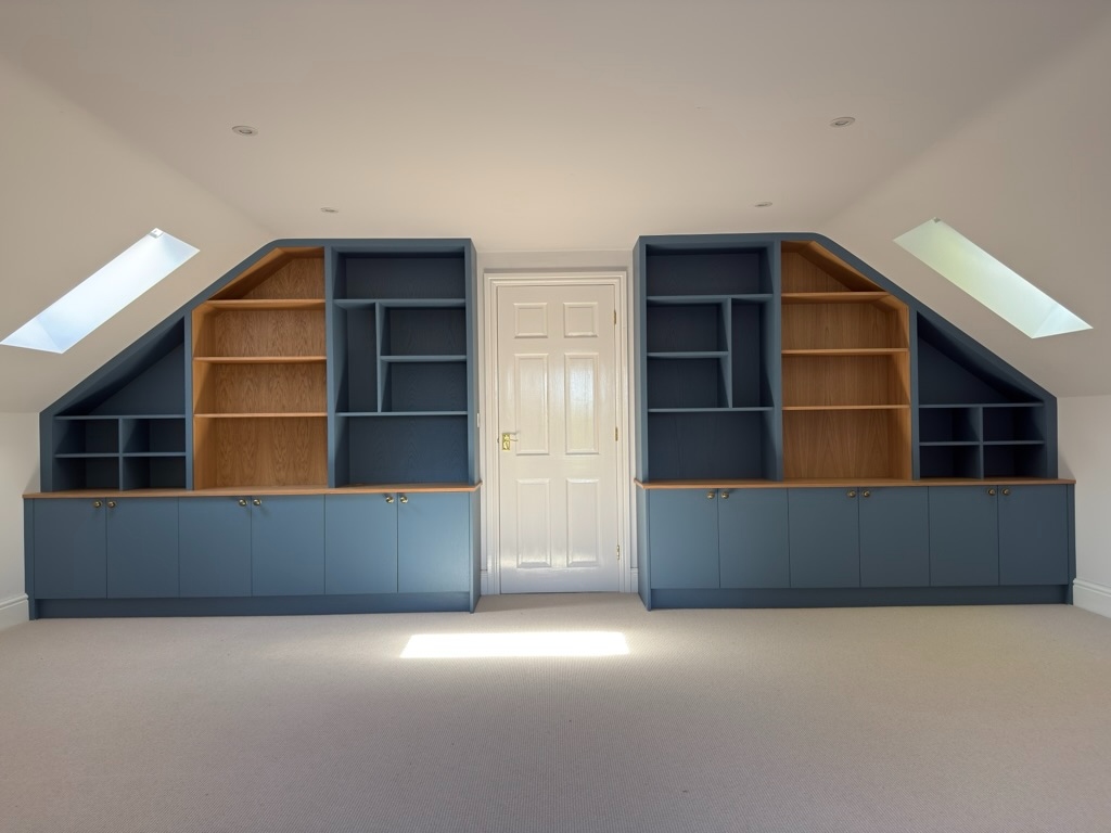 Watermill Lodge — blue and oak under-eaves home office with bespoke shelving
